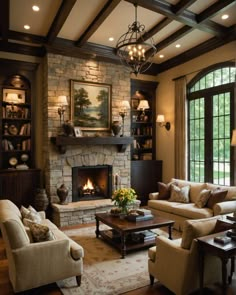 a living room filled with furniture and a fire place