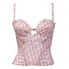 Indulge In The Whimsical Charm Of The Christian Dior Diorissimo Girly Pink Bustier Top In Size 32c. This Delightful Piece From The Spring 2004 Girly Collection By John Galliano For Christian Dior Features A Playful Pink And White Diorissimo Print, Accentuated With An Applique Leather Flower For Added Flair. Boasting A Ruffled Bust, Removable Straps, And A Sparkling Rhinestone Dior Logo Accent, It Exudes Femininity And Sophistication. Recommended For Sizes Xs/S, This Bustier Top Is A Statement Piece. Measurements Are Provided As A Guide: Length 17", Width 10"/10.5", Bust 13", Bottom Opening 11", Sleeve Width 0.5". Detailed Photos Reveal Any Discoloration Or Stains Present. Embrace Its Vintage Pink Tops For Women Classy, Dior Aesthetic Clothes, Pink Dior Outfit, Dior Outfits Women, Dior Bustier, 2000s Dior, Pink Sparkly Top, Graphic Tees Design Prints, Pink Bustier Top