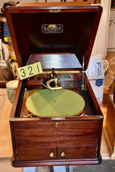 an old record player is open and ready to play