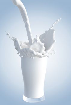 a milk splash in a glass on a blue background