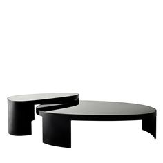 two black tables sitting next to each other