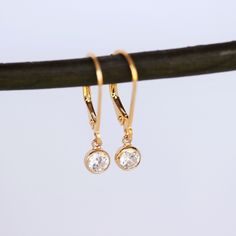 14k Gold Filled Modern Hoop Dangling Disc/Coin Earrings. This beautiful Earrings match with any outfit and comfortable wearing everyday. ★★Choose hoop style from drop down box . see picture no: #2. Then beautiful Earrings consists of -14k gold fill lever back Earrings. -6mm 14k gold fill bezel setting CZ dot necklace , -Come up with ribbon gift box and -One set of Care instruction package. MORE EARRINGS https://www.etsy.com/shop/rainbowearring1?section_id=22425645 Disc / Coin Necklace https://ww Classic Gold Diamond Earrings Hypoallergenic, Gold Teardrop Diamond Earrings With Vvs Clarity, Yellow Gold Round Crystal Earrings With Cubic Zirconia, Yellow Gold Crystal Earrings With Cubic Zirconia, Classic Gold Crystal Earrings With Ear Wire, Gold Hypoallergenic Dainty Diamond Earrings, Gold Dainty Hypoallergenic Diamond Earrings, Dainty Gold Hypoallergenic Diamond Earrings, Dainty Gold Diamond Hypoallergenic Earrings