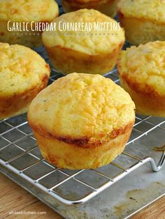 several muffins cooling on a wire rack