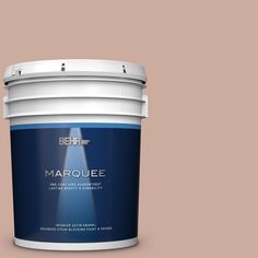 a bucket of marquee paint on a blue background