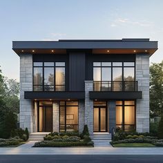 a two story house with black and white architecture