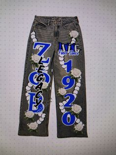 BUYER MUST PROVIDE THEIR OWN JEANS All artwork is hand painted and can be customized to your liking with any fraternity or sorority. Message me if you have any questions.  Once payment is received, you will receive shipping address. Please allow up to 6 weeks (this does not include the time it takes to be ship to you) for completion, starting from the date your jeans have been marked delivered to me. If you need it sooner, please message us to confirm availability. Hoco Pants, Hoco Jeans, College Spirit Wear, Spirit Jeans, Hbcu Grad, Painted Fashion, Homecoming Spirit, Painted Clothes Diy, Greek Apparel