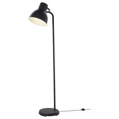 a black floor lamp with a white light on the top and an arm that is attached to it