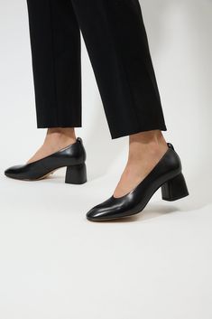 Pre-order with 20% off until August 20th Ships out on August 26th Heel height 2.4in Genuine leather Lining - Calf leather Crafted from high-quality materials, Georgia heels feature a sleek, timeless design that complements any outfit. The pointed-toe silhouette adds an elegant touch, while the sturdy block heel provides stability and all-day comfort. The smooth, supple upper ensures a luxurious feel, making these heels a standout addition to your collection. Timeless Pointed Toe Spring Heels, Timeless Calf Leather High Heels, Timeless High Heel Calf Leather Heels, Timeless High Heel Spring Heels, Office Square Toe Block Heels With Padded Heel, Sleek Calf Leather Almond Toe Heels, Stacked High Heel Block Heels For Office, Sleek Calf Leather Heels With Almond Toe, Office Block Heels With Stacked High Heel