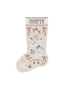 a cross stitch christmas stocking with the word harper on it and various items around it