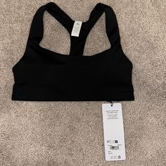 New Alo With Tags Airlift Advantage Racerback Bra Black Size Xs Casual Black T-back Activewear, Alo Yoga Fitted Sports Bra With Light Support, Alo Yoga Fitted Functional Tops, Alo Yoga Fitted Sports Bra For Training, Black Alo Yoga Athleisure Top, Alo Yoga Fitted Sports Bra For Gym, Alo Yoga Medium Support Sports Bra, Alo Yoga Seamless Crop Top For Workout, Alo Yoga Seamless Workout Crop Top