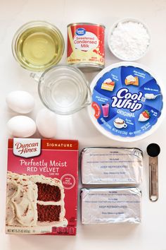 ingredients for cake sitting on top of a table