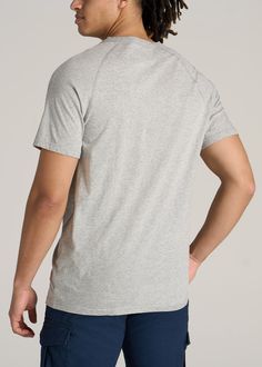 About Our Jersey Henley Tee for Tall Men The henley tee: effortless, comfortable and easy to style. An iconic wardrobe staple, it's high time there was a henley tee for tall men. This short sleeve is made with 100% jersey cotton that's incredibly soft and falls just right. Featuring our standard fit that's long enough for your torso without being baggy, it's a casual piece that goes with everything. Whether you pair it with chinos and jeans or your favorite joggers, you'll reach for this tall me Casual Raglan Sleeve T-shirt For Loungewear, Casual Henley Neckline T-shirt, Casual Cotton Crew Neck Henley, Cotton T-shirt With Henley Neckline, Casual Crew Neck Henley For Loungewear, Casual Relaxed Fit Henley For Gatherings, Gray Cotton Henley Neckline Top, Casual Gray Henley Neckline Top, Casual Cotton Henley For Gatherings