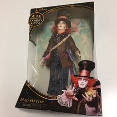 the doll is in its package and has an evil look on it's face