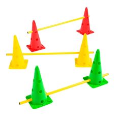 four plastic cones and sticks with holes in them