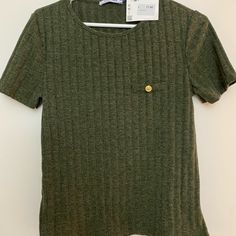 Dark Olive Green Shirt In Perfect Condition Has Never Been Worn And Still Has Tags Attached. Size Large But Has A Slim Fit So If You Are A True Size Medium It Will Fit Perfectly. Zara Crew Neck Top For Work, Trendy Zara Tops For Workwear, Trendy Zara Tops For Work, Zara Casual Tops For Workwear, Zara Short Sleeve Tops For Work, Zara Short Sleeve Tops For Fall, Green Crew Neck Top For Work, Zara Casual Short Sleeve Blouse, Casual Zara Knit Top With Short Sleeves