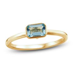 Add a subtle pop of color to your look with this simply shimmering bezel-set natural aquamarine ring. 10K yellow gold A bezel-set natural aquamarine is set east to west at the center Add to your stack or wear it as a standalone style Bezel Aquamarine Ring, Birth Ring, Gold Aquamarine Ring, Push Gifts, Ring Inspo, Birthstone Rings, Jared The Galleria Of Jewelry, Bezel Set Ring, Bezel Ring