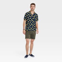 Show off your fun, summery style during casual outings in this Collared Button-Down Shirt from Goodfellow & Co™. This lemon printed short-sleeve shirt is made from breathable poplin fabric to offer cool and comfortable all-day wear. Tailored in a standard-fit, it features a collared neckline, front button-down and chest patch pocket to add a touch of classic style to your everyday looks. Wear it with shorts and loafers for a casual vibe or pair with jeans and sneakers for a dressed-up look. Good Lemon Print, Shipt Shopper, Lemon Yellow, Poplin Fabric, Cargo Pants, Printed Shorts, Warm Weather, Short Sleeve Shirt, Button Downs