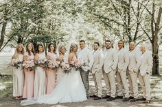 Belle Gardens Deer Park Wedding. Garden roses. Lush Flowers. Greenery. Fairytale wedding. Blush pink bridesmaid dresses. Groom and groomsmen in tan tuxedos. Twinkle lights. White drapes at altar / arbor. Pink And Champagne Bridesmaid Dresses, Blush Wedding Groomsmen, Blush Groomsmen, Tan Suit Wedding, Pink Groomsmen, Tan Bridesmaids, Blush Pink Theme Wedding, Champagne Wedding Colors, Pink And Champagne