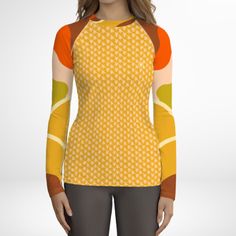 Women's UPF 50+ Rash Guard, Swim Shirt for Sun Protection in a cute 60s Mod Floral print. This swim shirt protects you from the sun, wind, and other elements while doing your favorite water sports. The slim fit, flat ergonomic seams, and longer body give extra comfort. Size tip: Petite and shorter torso lengths should consider sizing down. • 82% polyester, 18% spandex • 6.78 oz • Soft four-way stretch fabric • UPF 50+ • Comfortable longer body and sleeves • Flatseam and coverstitch Made to order Fitted Long Sleeve Tops For Beach, Fitted Long Sleeve Tops For The Beach, Fitted Long Sleeve Beach Top, Long Sleeve Stretch Top With Uv Protection, Long Sleeve Uv Protection Stretch Top, Fitted Tops With Upf 50+ For Summer, Uv Protection Long Sleeve Stretch Top, Fitted Crew Neck Top For Beach, Fitted Upf 50+ Tops For Summer