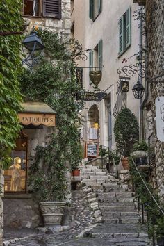 an old building with stairs leading up to it and the words saint paul de vence france