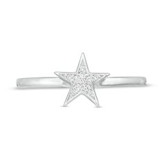 She'll love the simply stellar style of this dreamy diamond accent ring. Crafted in sterling silver, this spirited choice showcases a sculpted star shimmering with diamond accents. Polished to a bright shine, this design is an irresistible eye-catcher. This ring is available in select sizes only. Sterling silver rings cannot be resized after purchase. Silver Star-shaped Ring With Diamond Accents, Celestial Star-shaped Diamond Ring With Single Cut Diamonds, Celestial Star-shaped Diamond Ring, Sterling Silver Star-shaped Diamond Ring, Anniversary White Gold Star-shaped Diamond Ring, Star-shaped Rings With Diamond Accents, Sterling Silver Star-shaped Diamond Ring For Anniversary, Sterling Silver Star-shaped Diamond Promise Ring, Silver Star-shaped Diamond Ring For Anniversary