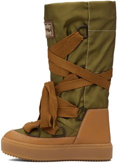 Calf-high paneled canvas and buffed leather boots in green. · Lace-up closure · Rubberized logo patch at collar · Sherpa fleece lining in beige · Treaded rubber platform sole · Contrast stitching in white · Platform: H1.25 in Supplier color: Military green Boots Two Tone, X Boots, Crocidile Boots, Trndy Boots, Contrast Sole Boots, White Boots Green Dress, Botas Prace Shoes, Heel Rubber Boots, Super Flat Boots