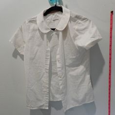 French Toast Teens Short Sleeve Collared White Button Down Shirt, Nwt Girls 14 Lightly Used Questions? Leave A Comment Below! Classic School Shirt With Button Closure, Classic Cotton Tops With Peter Pan Collar, Casual Tops With Peter Pan Collar And Button Closure, Fitted School Shirt With Button Closure, Spring Button-up Shirt For School, Summer School Uniform Top, White School Shirt With Button Closure, Solid Color School Top With Button Closure, White School Shirt With Buttons