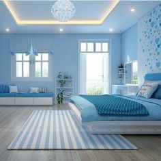 a bedroom with blue walls, white furniture and wooden floors is pictured in this image