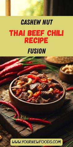 cashew nut thai beef chili recipe in a bowl on a wooden table with red peppers