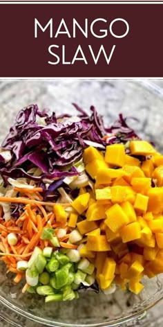 mango, cabbage, and carrots in a glass bowl with the words mango slaw