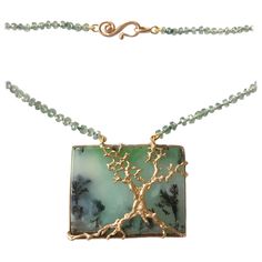 Dalben design necklace composed of a rectangular dendritic chrysoprase , green faceted bead sapphire , 18 k rose gold closure and carved tree bezel setting. The necklace length is 26 inch ( 67 cm ). Bezel dimension: 38,7 x 30 mm Beads dimension : sapphire 3 mm . Handmade Green Rectangular Necklace, Green Rectangular Gemstone Beads Jewelry, Unique Green Necklace With Rectangular Pendant, One-of-a-kind Green Chrysoprase Necklace, Rectangular Jade Gemstone Necklaces, Rectangular Jade Gemstone Necklace, Rectangular Green Jewelry With Natural Stones, Green Rectangular Jewelry With Natural Stones, Unique Green Rectangular Jewelry