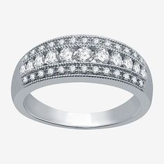 a white gold ring with diamonds on it