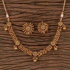 South Indian Bridal Traditional with matte gold plating Necklace Set with Earrings. Temple choker set. Gorgeous 24 K gold plated. This Necklace set comes in a beautiful gift box, making it an ideal gift for birthdays, weddings or anniversaries. Occasion: Perfect choice for any Indian occasion. Care: It is advisable that you keep products away from direct heat, humidity, and moisture. It is best to preserve your jewelry in the bag/box provided with the package. 100% Satisfaction Guarantee, Highes Indian Gold Necklace Set, Gold Necklace Set Indian, Indian Gold Necklace, Gold Pearl Choker, Guttapusalu Necklace, Matte Gold Necklace, Temple Necklace, Necklace Closure, Indian Choker Necklace