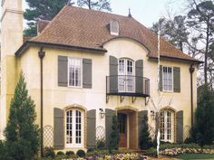 a large white house with lots of windows