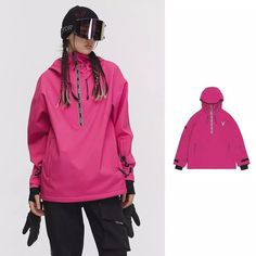 a woman wearing a pink jacket and black pants with ski goggles on her head