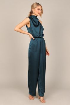 DETAILS    wide leg style jumpsuit   one sleeve design  high neckline with button close  back invisible zip  elasticised waistband   satin sheen finish  unlined  material - 95% polyester / 5% elastane    SIZING    model is 5' 7" and wears a Size XS  model stats: bust - 32", waist - 25", hips - 35"       GARMENT CARE    cold hand wash separately Christmas Party Outfits For Teens, Teal Bridal Party, Christmas Party Outfit Work, Teal Jumpsuit, Style Jumpsuit, White Dress Shoes, Wedding Guest Attire, Summer Playsuit, One Shoulder Jumpsuit