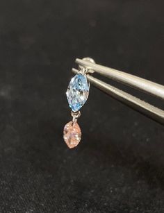 18K Solid Gold Floating Pink/Blue Diamond Threaded Stud Earring, Au750 Unique extremely shiny earrings for Women, Wedding Valentine's Day Anniversary gift for her. Setting this floating diamond charm at your favourite jewellery will ensure comfort for everyday wear, but will eliminate concerns about bending or breaking. Timeless and an elegant choice for all genders, this 18k solid gold extremely shiny floating earring is timeless, it catches the eye right now. The earring is made of sturdy 18k gold to avoid metal-to-metal reactions. More Information GOLD: 18K Solid Gold GEMSTONE: Lab Grown Pink/Blue Diamond GEMSTONE WEIGHT:  Blue Marquise Diamond 0.2ct; Pink Marquise Diamond 0.15ct NOTE: Described information and price is for a SINGLE earring. From the design to the finished product, to t Pink Teardrop Earrings With Prong Setting, Pink Dangle Earrings With Prong Setting, Floating Earrings, Shiny Earrings, Diamond Charm, Marquise Diamond, Anniversary Gift For Her, Single Earring, Pink Diamond