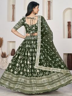 Elegance meets allure in this enchanting green jacquard lehenga ensemble, adorned with opulent zari embroidery and shimmering sequin work. The verdant green hue exudes vibrance and sophistication, making it an exquisite choice for weddings, celebratory events, and special occasions. Crafted from luxurious jacquard fabric, the semi-stitched lehenga offers a comfortable fit of up to 42 inches, ensuring both style and ease of movement throughout the festivities.
Complementing the resplendent leheng Semi-stitched Green Embroidered Fabric With Self Design, Eid Green Sharara With Meenakari Details, Festive Green Meenakari Sharara, Green Dola Silk Lehenga For Navratri, Green Dola Silk Lehenga With Resham Embroidery, Green Meenakari Saree For Reception, Green Floor-length Dola Silk Choli, Green Traditional Wear For Reception With Meenakari, Reception Green Traditional Wear With Meenakari