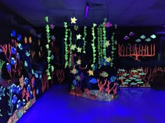 a room filled with lots of different types of decorations on the walls and under lights