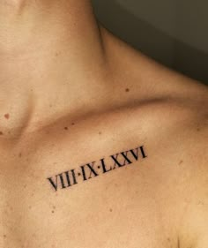 a man's chest with the word vih - lxv on it