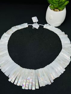 One Piece white Mother of pearl beaded necklace,  Beads Necklace. Handmade/Hand Braided Necklace Necklace length: 20.7 Inches Materials: White Mother of Pearl Adjustable length: No Can be personalized: Yes We take order work as well. Feel free to contact for purchasing goods in bulk. We are Wholesaler & manufacturers of semi-precious & precious gemstones, Loose Gemstones Beads, Cabochons. Measurements & weight are close approximations White Shell-shaped Pearl Drop Necklace, White Mother Of Pearl Round Bead Necklaces, White Mother Of Pearl Beaded Necklace With Pearl Drop, White Mother Of Pearl Necklace With Round Beads, White Mother Of Pearl Round Beads Necklace, White Pearl Necklaces With Colorful Beads, White Necklaces With Colorful Beads For Party, White Pearl Jewelry With Faceted Beads, Pearl White Mother Of Pearl Necklace With Round Beads