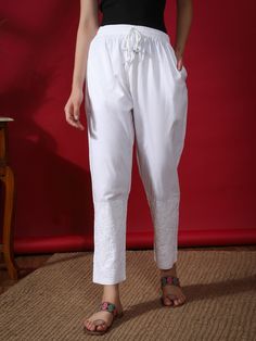 Check out for more exclusive collections from Seva :- https://www.etsy.com/in-en/shop/SevaChikanLko Product Code : SCL11001 Fabric: Cotton  Length: 38 inches Color: White  Waistband: Elasticated Embroidery: Ghasspatti & Phanda Thread Color:  White  Washing Instructions:  Handwash Only Delineation: Purchase this elegant and comfortable White Chikan Trouser online from Seva, is ideal for any fashionista. It has white-coloured rich and attractive chikan embroidery. Fabric of the Trouser offers a relaxed silhouette and comfort to the wearer. Buy this classic lower for any occasion, festival, party celebrations. Pair it with any contrasting color kurta. Disclaimer: There may be some minor dissimilarities in crafting and embroidery than showcase image. Since it is handcrafted product and these m Traditional Cotton Pants For Loungewear, Traditional Cotton Lounge Pants, Summer Cotton Pants With Chikankari Embroidery, Spring Cotton Bottoms With Lace Work, Cotton Bottoms With Chikankari Embroidery For Spring, Bohemian Chikankari Embroidery Bottoms For Summer, Spring Cotton Pants With Chikankari Embroidery, Summer Chikankari Embroidery Pants, Spring Cotton Bottoms With Chikankari Embroidery