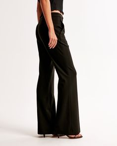 Mid rise, flare pants in a menswear fabric, featuring a removable mini belt, slim waistband, functional pockets and a zipper closure. Flare Pant, Women's Bottoms, Athletic Fits, New Arrival Dress, Swimwear Accessories, Flare Pants, Abercrombie Fitch, Jumpsuit Dress, Womens Bottoms