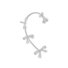 Make a chic statement with our Diamond Bow Ear Cuff. This dainty piece is plated in 14k white gold for a touch of elegance. Perfect for adding a pop of pink or clear sparkle to any outfit. Sold individually for ultimate versatility. Elegant Diamond Ear Cuff As Gift, Elegant Cubic Zirconia Ear Cuff For Gifts, Trendy White Cubic Zirconia Jewelry, Chic Single Ear Cuff As Gift, Silver Cubic Zirconia Ear Cuff For Party, Chic Single Ear Cuff For Gift, Adjustable White Gold Ear Cuff, Elegant White Ear Cuff As Gift, Rose Gold Ear Cuff For Party