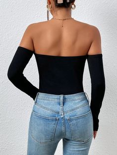 This Off-Shoulder Bodysuit is a showstopper. The long sleeves and slim fit design flatter your figure, while the medium-stretch fabric ensures comfort. The black color adds sophistication, perfect for a night out with friends or a date. The 95% Polyester and 5% Elastane composition ensures durability and easy maintenance. Whether you pair it with jeans or a skirt, you're sure to turn heads. Features: Color: Black Neckline: Off the Shoulder Sleeve Length: Long Sleeve Sleeve Type: Regular Sleeve F Comfy Jumpsuits, Body Measurements, Shoulder Sleeve, Sleeve Type, Stretch Fabric, Off The Shoulder, Black Color, Off Shoulder, Types Of Sleeves