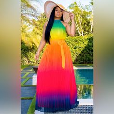 This Colorful Pleated Dress Will Have You Looking Magnificent This Summer While Keeping You Cool And Beautiful Get It While It’s Hot! Fitted Rainbow Dress For Beach, Vibrant Rainbow Dress For Spring, Multicolor Pleated Maxi Dress For Party, Multicolor Pleated Dresses For The Beach, Multicolor Pleated Dress For Beach, Vibrant Orange Summer Dress, Summer Multicolor Pleated Dress, Pleated Multicolor Beach Dresses, Multicolor Pleated Maxi Dress For Vacation