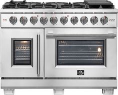 an oven with four burners and two doors on each side, in stainless steel