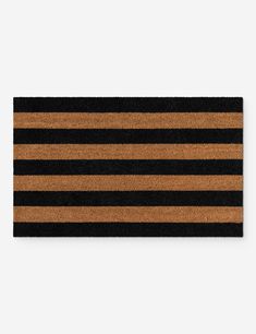 a black and brown door mat with horizontal stripes on the front, side or back