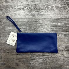 Small Sized Wristlet 11 In W X 5.5 In H Zip Closure Blue New With Tags From L’artigiano Sorrentinio Blue Clutch With Zipper Pouch For Daily Use, Blue Zipper Pouch Clutch For Daily Use, Blue Rectangular Clutch For Everyday, Blue Pouch Clutch With Zipper Closure, Everyday Blue Clutch With Zipper Pouch, Blue Pouch Clutch For Everyday Use, Blue Clutch With Zipper Pouch, Blue Everyday Pouch Clutch, Everyday Blue Pouch Clutch