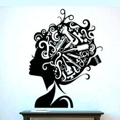 a woman's head with curly hair and scissors in her hair wall decal